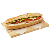 White Baguette with smoked turkey, Gouda cheese, mayonnaise, tomato and lollo lettuce.