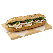 Multigrain Baguette with smoked turkey, avocado spread, cream cheese, sun-dried tomatoes, boiled egg and rocket.